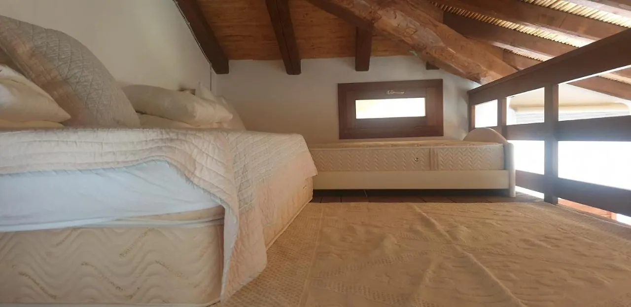 Lägenhet Residenze Coda Cavallo
